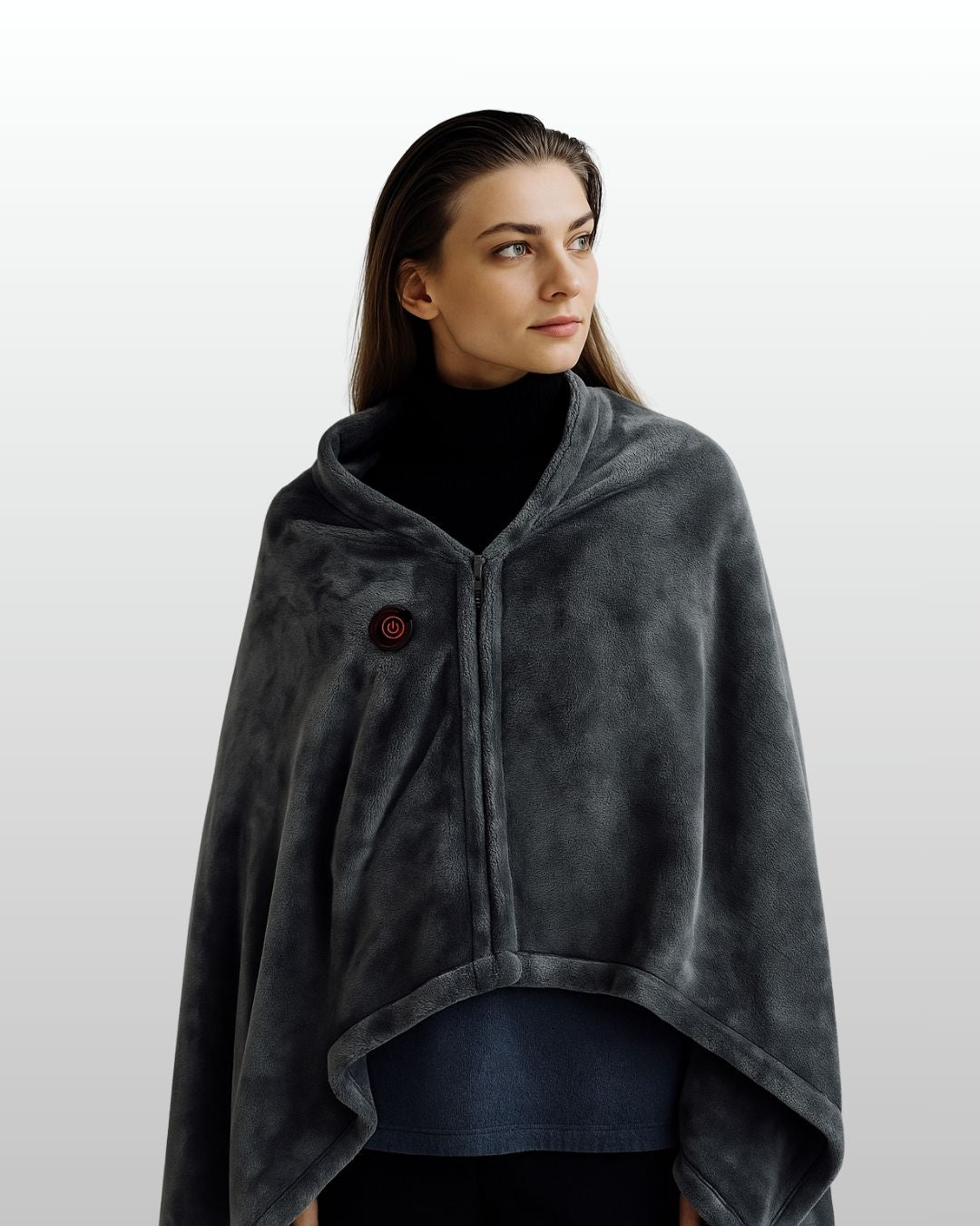 Woman wearing Caldora heated shawl as a sweater indoors