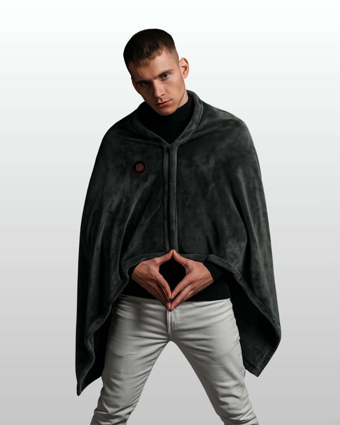 Man wearing Caldora heated shawl as a sweater indoors